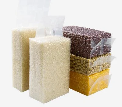 La bolsa de vacío de envasado de arroz en relieve de nylon PE grabó en relieve las bolsas de plástico que se pueden cerrar al vacío